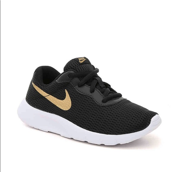 gold nike shoes kids